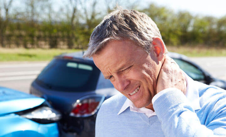 man strained neck pain car accident